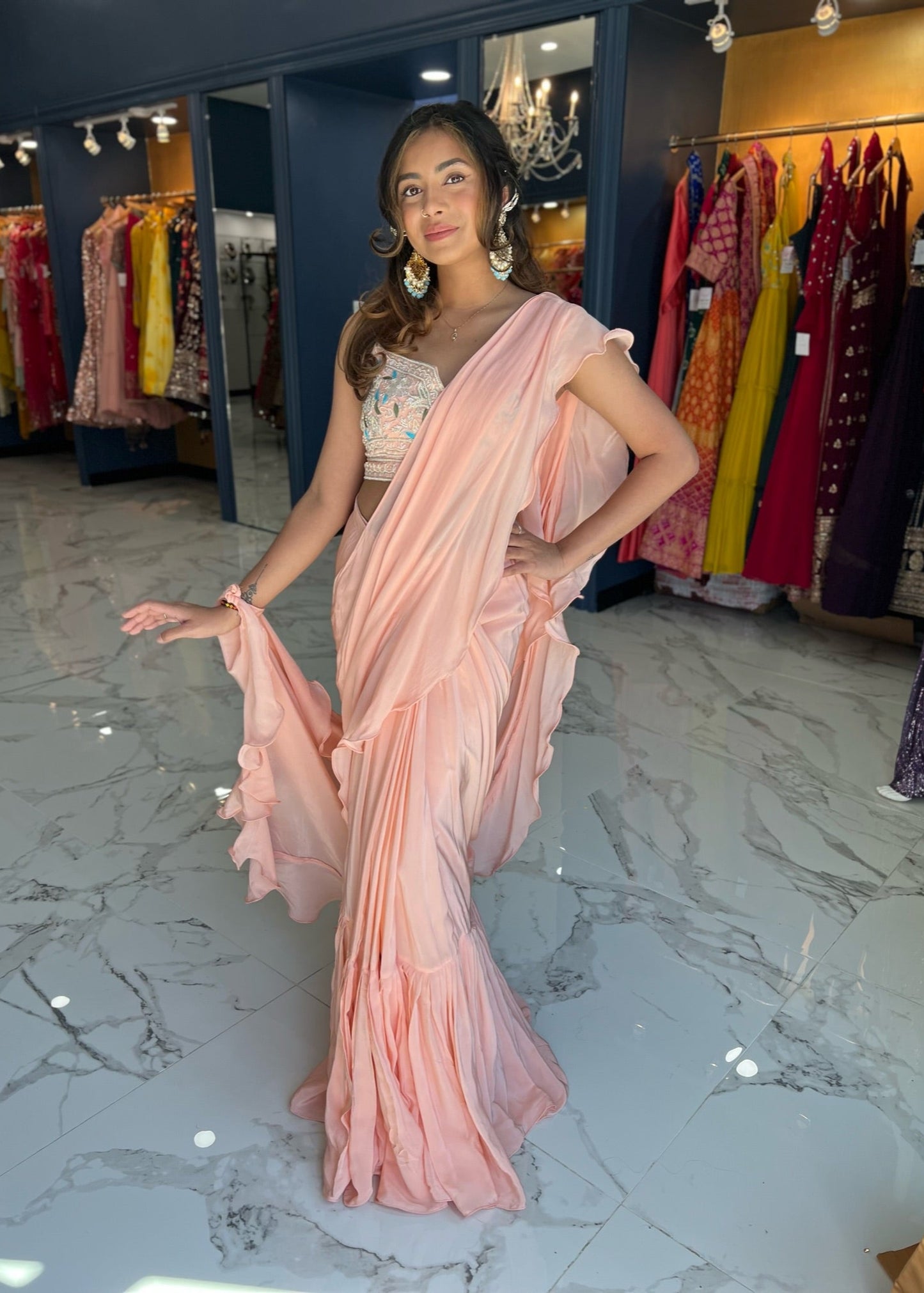 peach color ruffle saree