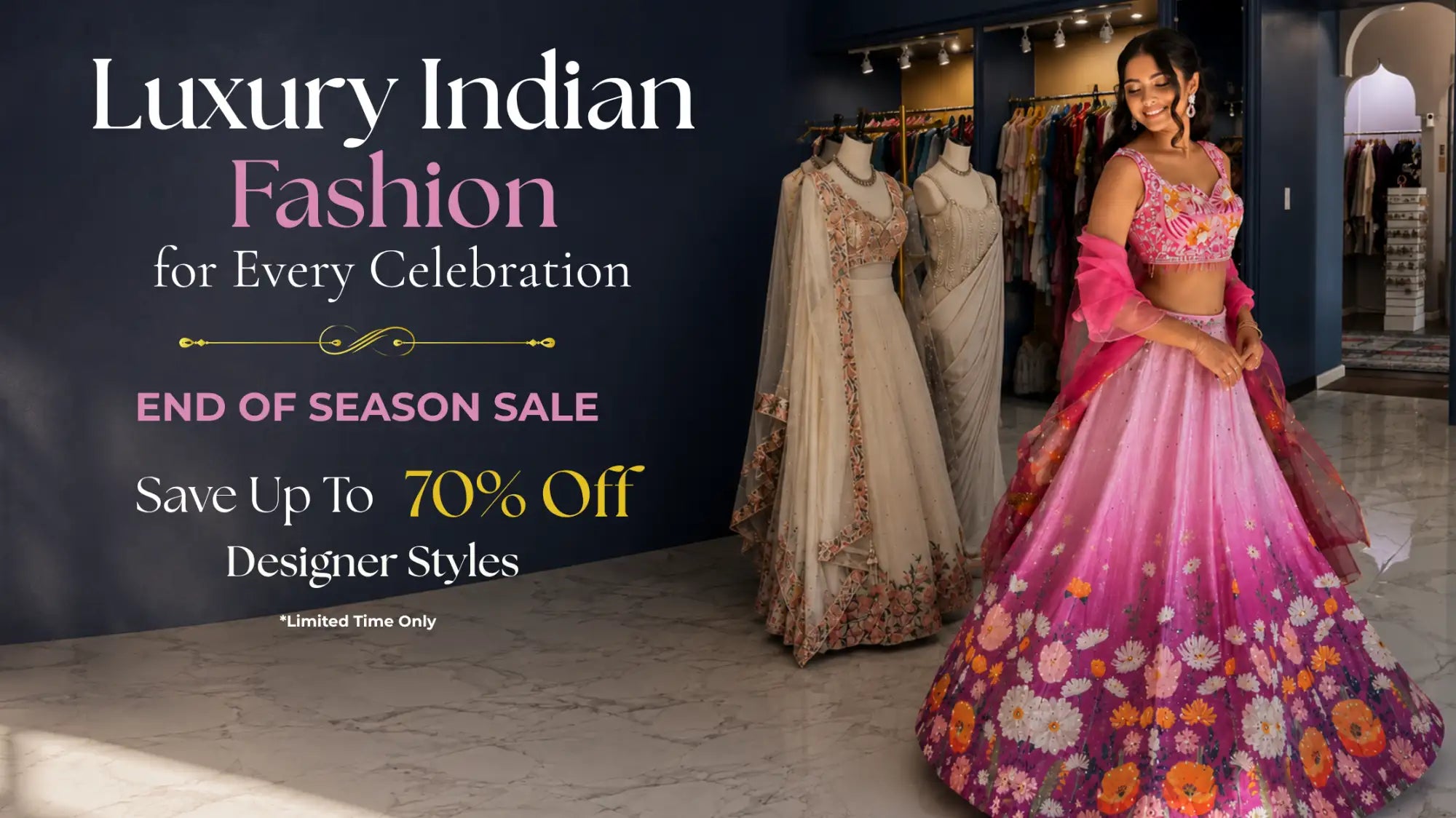 A woman wearing a vibrant pink and purple floral lehenga with intricate embroidery.